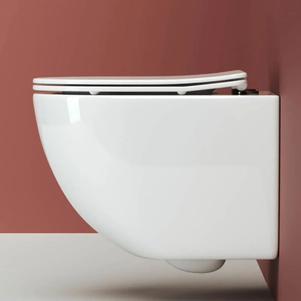 Унитаз подвесной Ceramica Nova Forma безободковый CN3009 (детальная фотография), недорогие, безободковые, сиденье с микролифтом , с антивсплеском