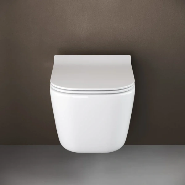 Унитаз подвесной Ceramica Nova New Day безободковый CN3005 (детальная фотография), недорогие, безободковые, сиденье с микролифтом , с антивсплеском