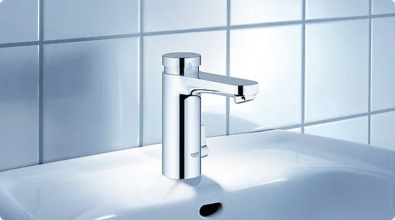 Смеситель для раковины порционно-нажимной Grohe Eurosmart Cosmopolitan 36317000 (детальная фотография), хром