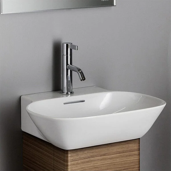 Раковина Laufen Ino 56 см с отверстием для смесителя, с переливом 8.1030.2.000.104.1 (детальная фотография), подвесные, накладные (на столешницу), пристенные