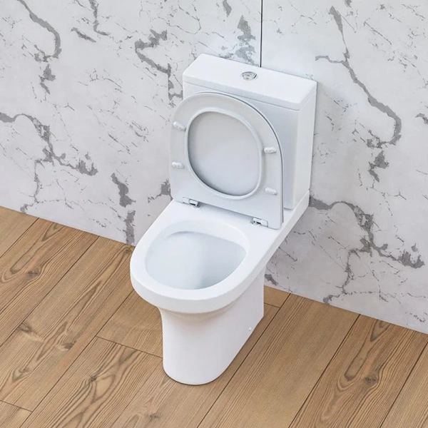 Унитаз компакт Damixa Skyline безободковый DX35C8600SC (детальная фотография), с горизонтальным, прямым выпуском, с прямым выпуском