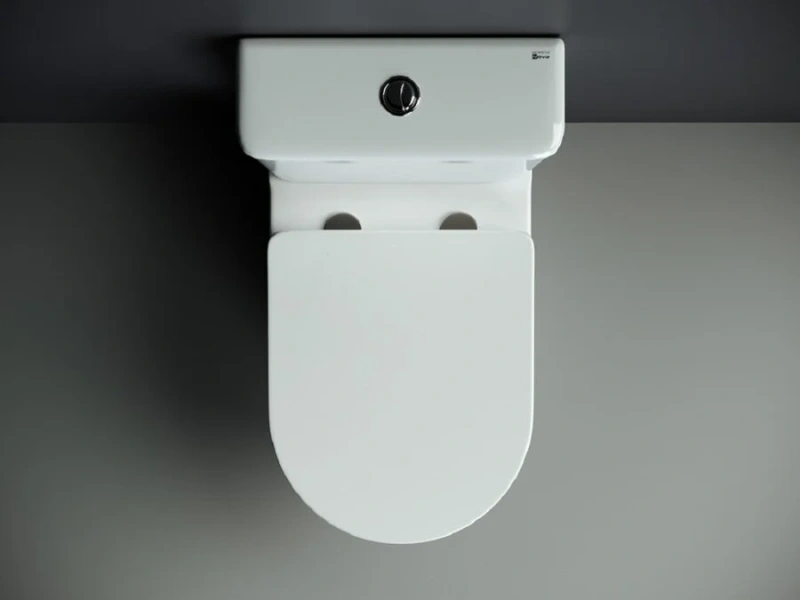 Унитаз компакт Ceramica Nova Mia безободковый CN1801 (детальная фотография), безободковые, сиденье с микролифтом , компакт, низкие